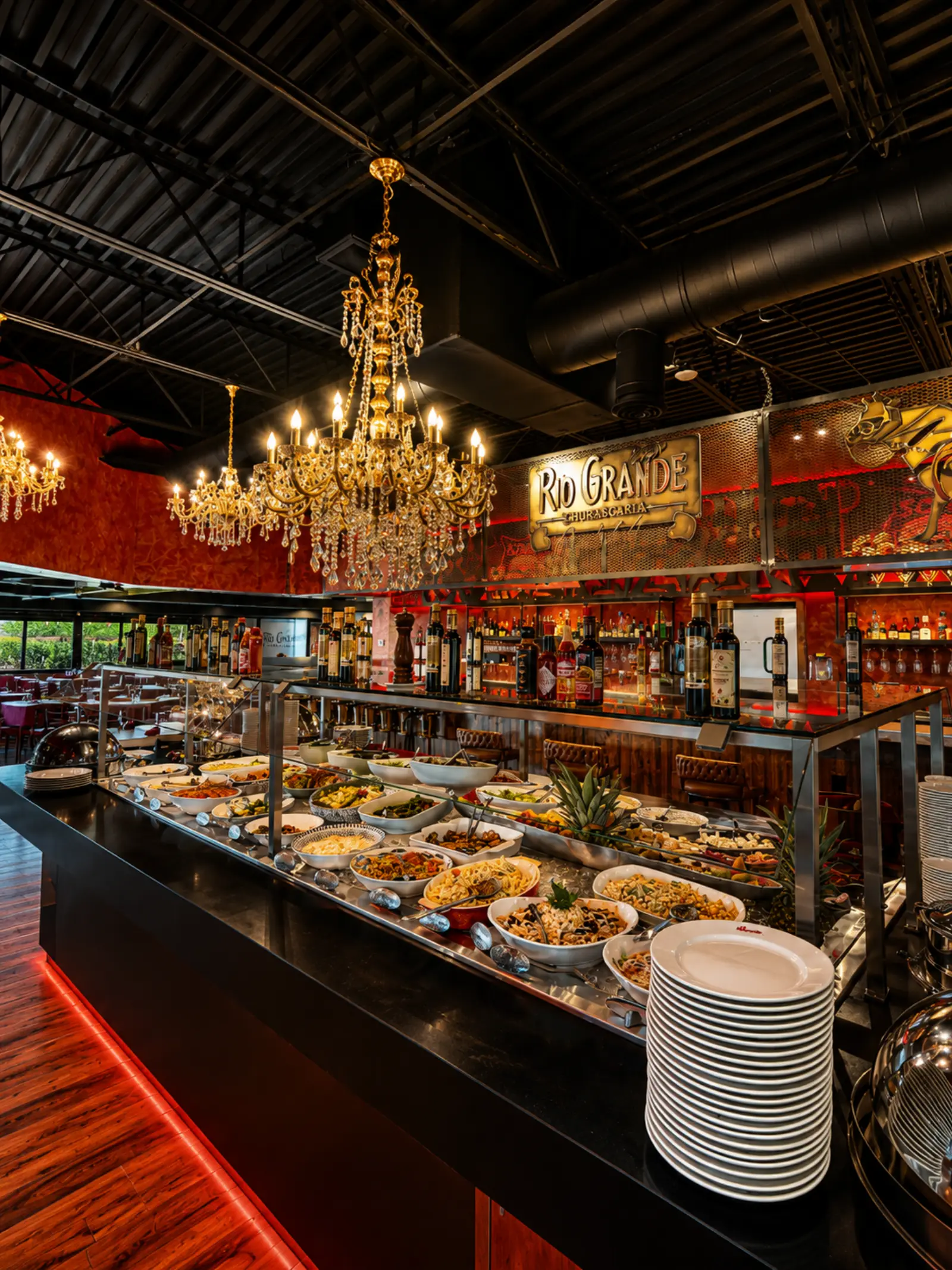 The salad area with fresh salads and hot dishes